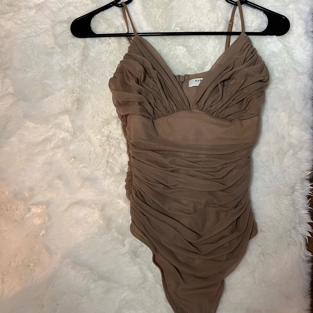 Brand new body suit from Aritzia